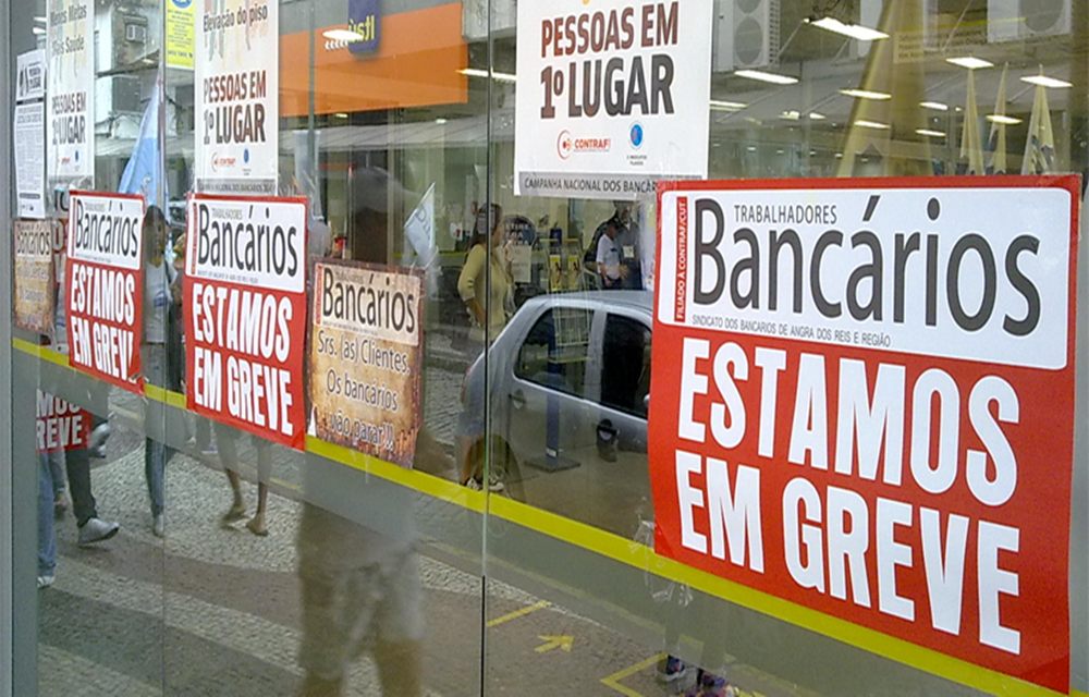Ir para  <p>A greve dos banc&aacute;rios, que entrou hoje (28) em seu 23&ordm; dia, j&aacute; &eacute; a terceira mais longa desde 2004, quando a paralisa&ccedil;&atilde;o chegou a 30 dias. Em 2013, a segunda maior do...